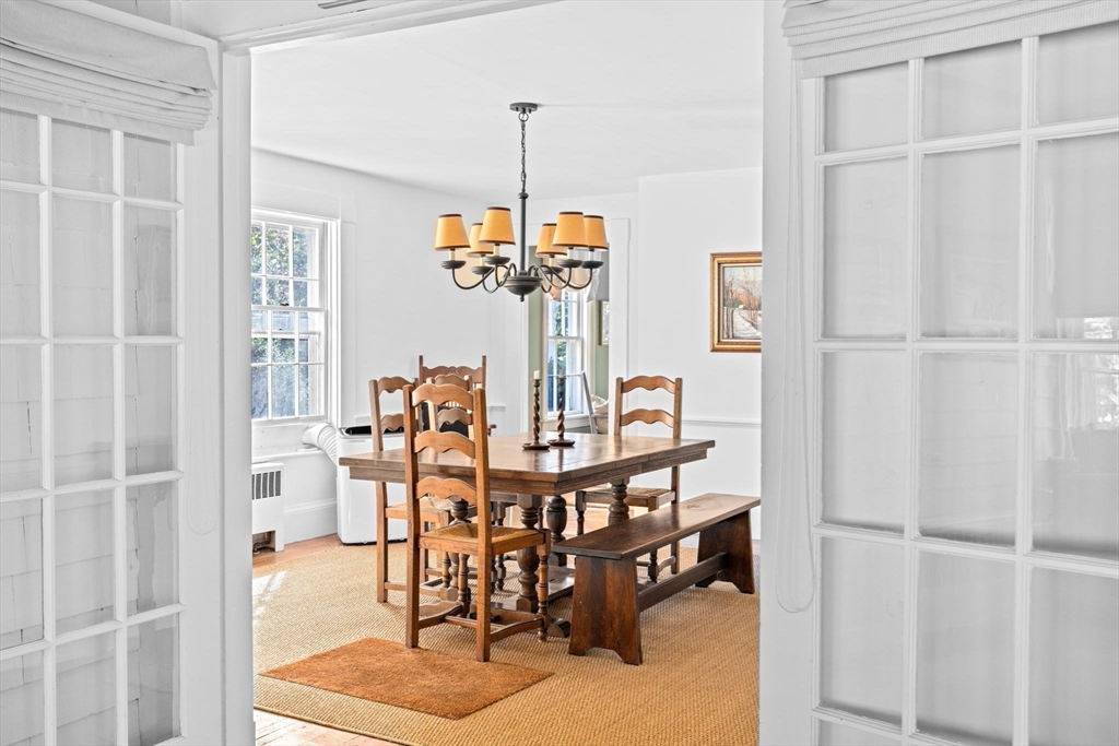 74 Tilden Road Scituate, MA 02066 - Photo 17 of 42 a view of a dining room with furniture and window