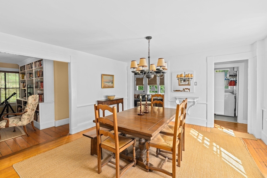 74 Tilden Road Scituate, MA 02066 - Photo 19 of 42 a view of a dining room with furniture and wooden floor