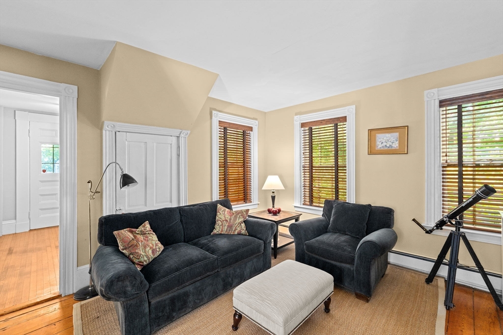 74 Tilden Road Scituate, MA 02066 - Photo 20 of 42 a living room with furniture and a window