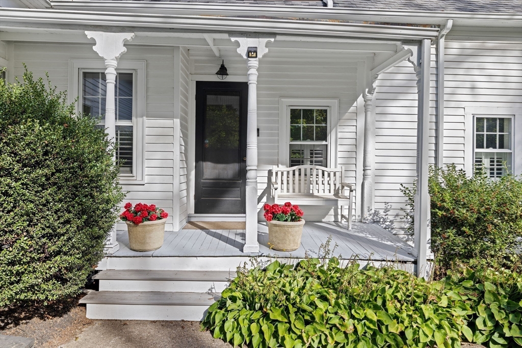 74 Tilden Road Scituate, MA 02066 - Photo 2 of 42 a front view of a house with a fountain