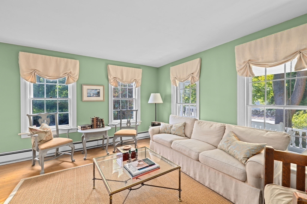 74 Tilden Road Scituate, MA 02066 - Photo 26 of 42 a living room with furniture and a large window