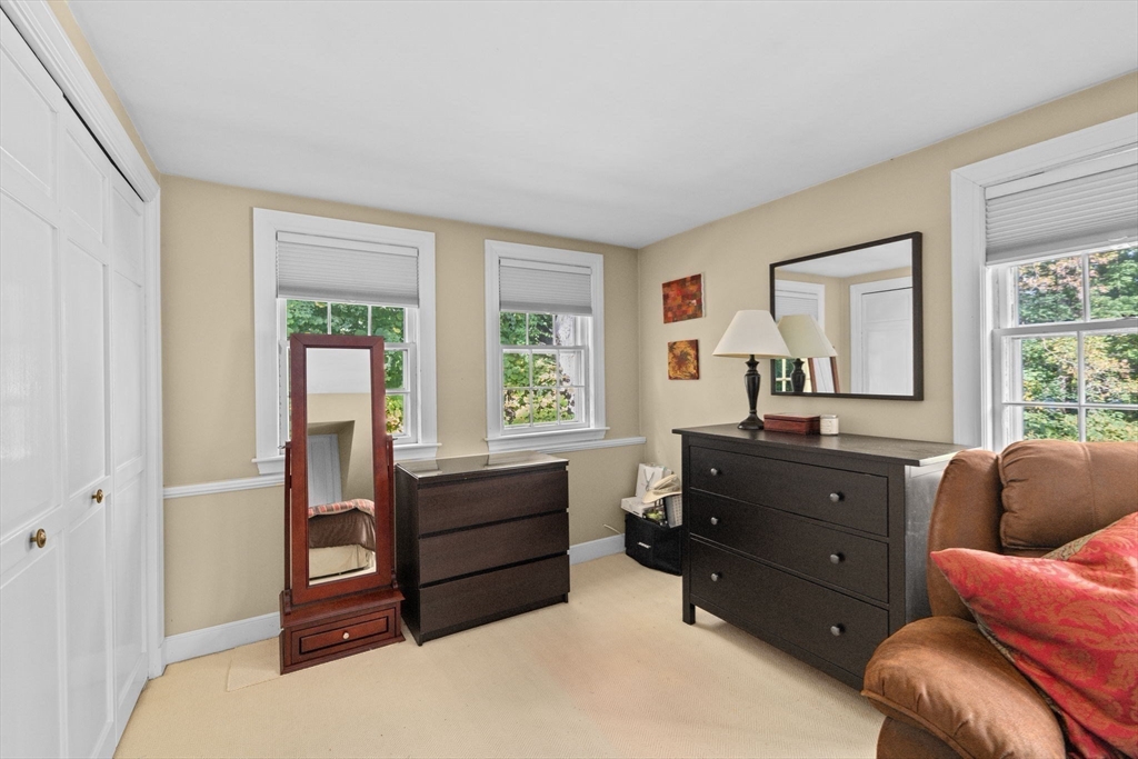 74 Tilden Road Scituate, MA 02066 - Photo 29 of 42 a living room with furniture and a window