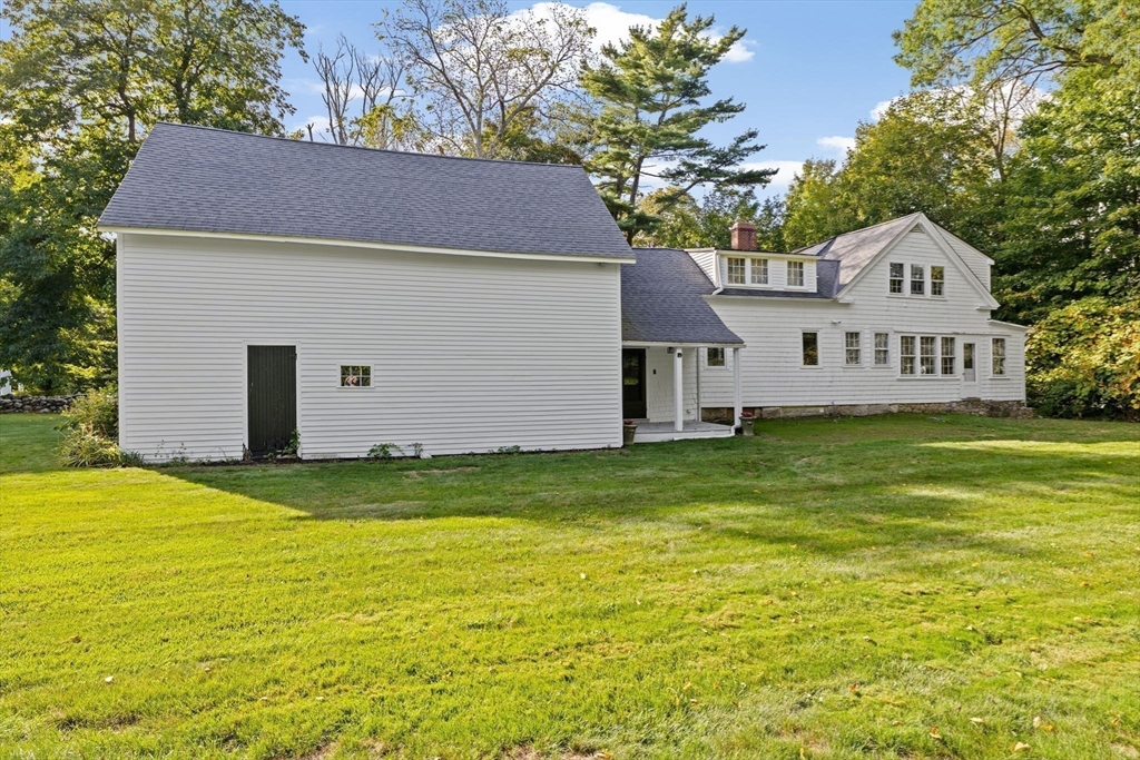74 Tilden Road Scituate, MA 02066 - Photo 37 of 42 a view of a house with a yard