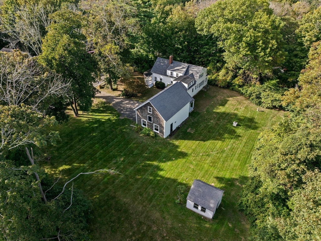 74 Tilden Road Scituate, MA 02066 - Photo 40 of 42 an aerial view of a house with a yard