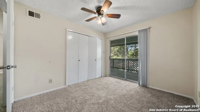 a bathroom with a double vanity sink toilet mirror and bathtub