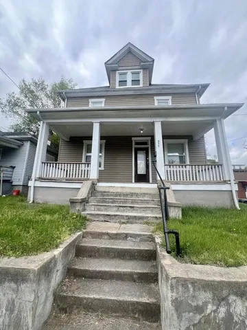 a view of house with a street view