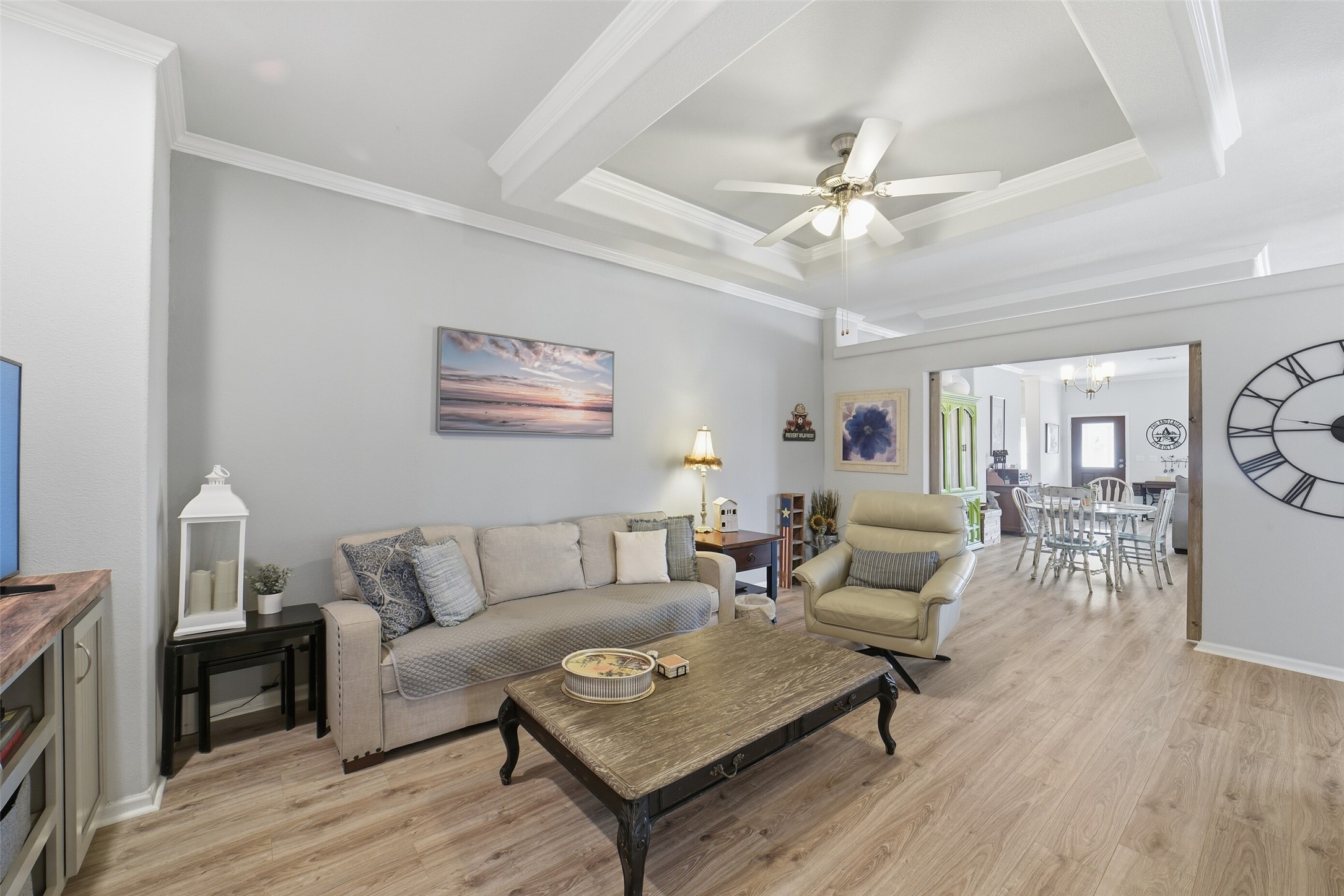 4007 Nancy Lane, Unit C546B Rosharon, TX 77583 - Photo 28 of 50 a living room with furniture a rug and a chandelier