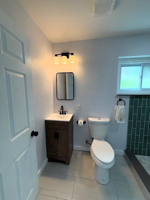 1231 Denisonview Street Pittsburgh, PA 15205 - Photo 16 of 21 a bathroom with a toilet sink and mirror