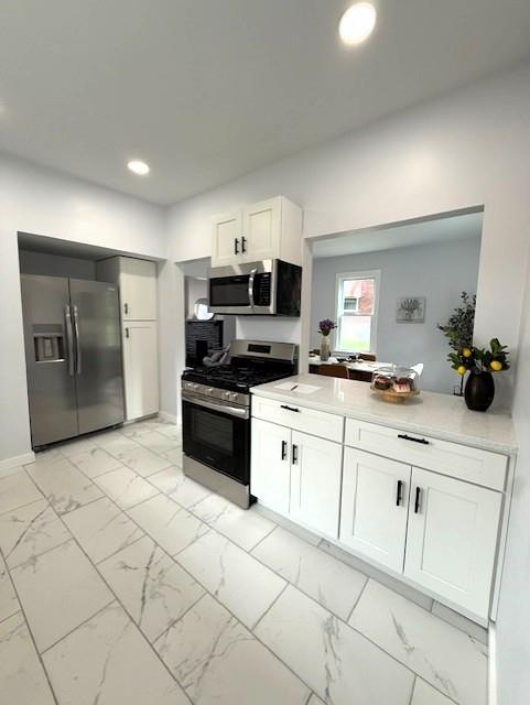 1231 Denisonview Street Pittsburgh, PA 15205 - Photo 5 of 21 a kitchen with granite countertop a cabinets and steel appliances