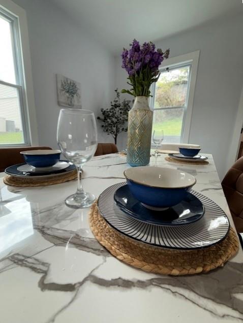 1231 Denisonview Street Pittsburgh, PA 15205 - Photo 7 of 21 a table with a vase and flowers