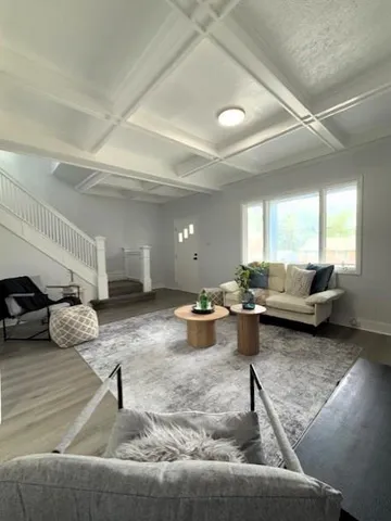 a living room with furniture and a couch