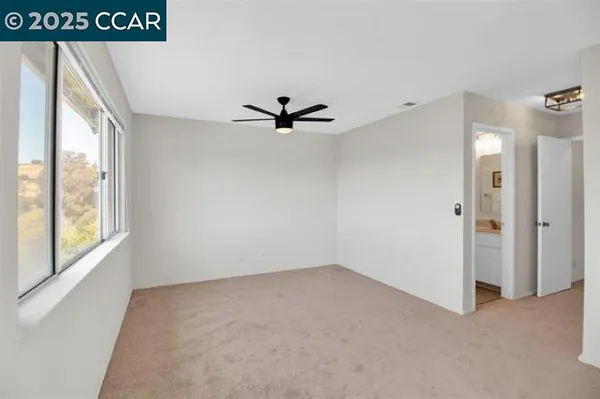 a view of a room with a window