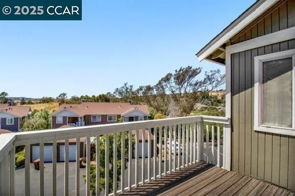 a view of a street from a balcony