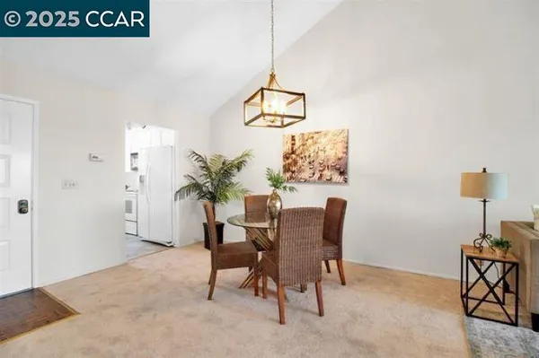 a view of a workspace with furniture