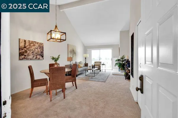 a view of a livingroom and dining room