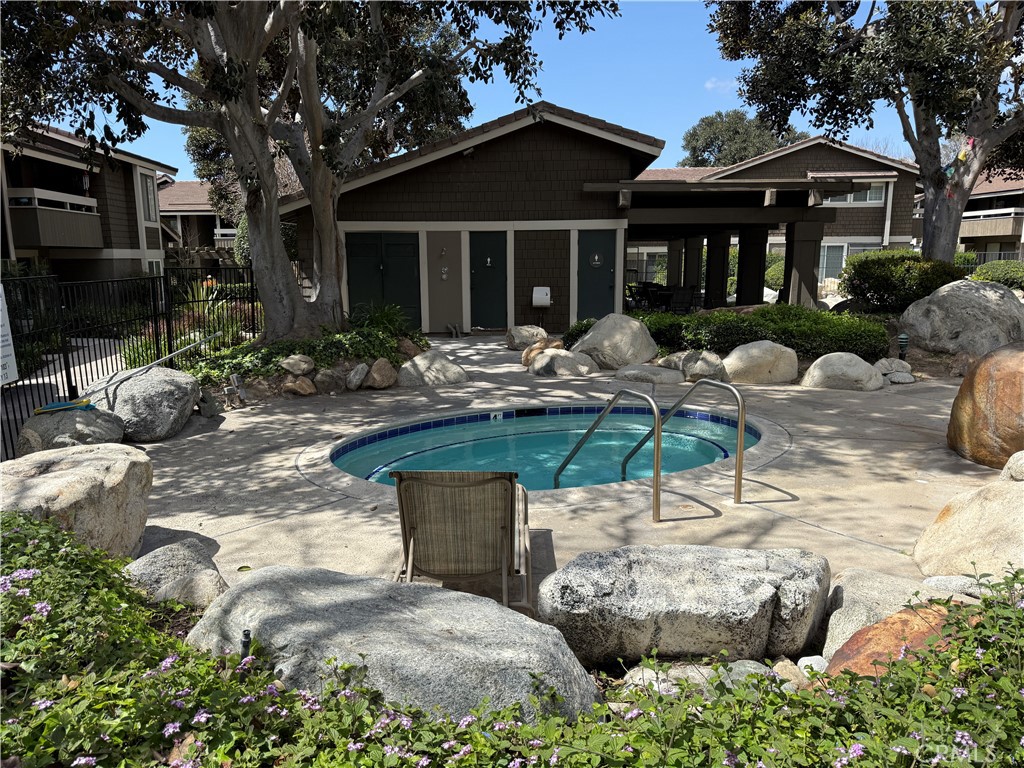 229 Springview Irvine, CA 92620 - Photo 16 of 16 a backyard of a house with yard fire pit and outdoor seating