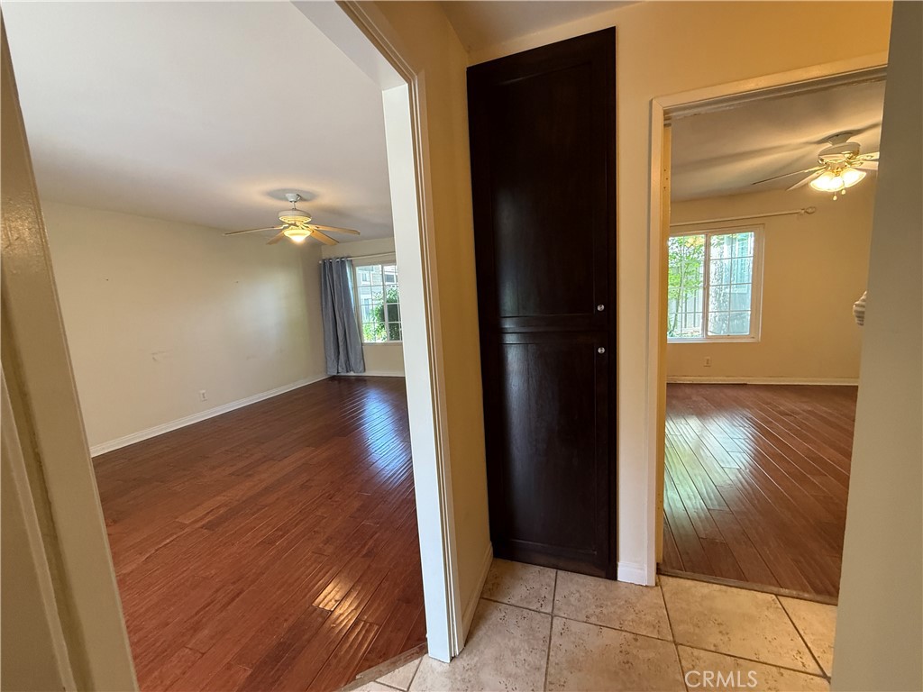229 Springview Irvine, CA 92620 - Photo 8 of 16 a view of hallway with wooden floor