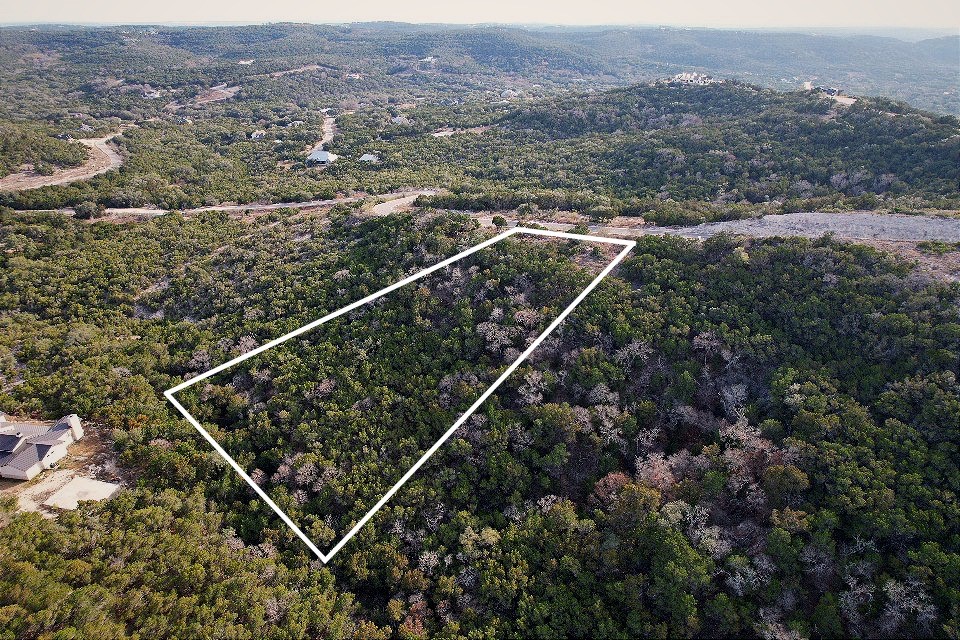 0 Private Road 1748 Road Mico, TX 78056 - Photo 4 of 14 an aerial view of residential house with parking space