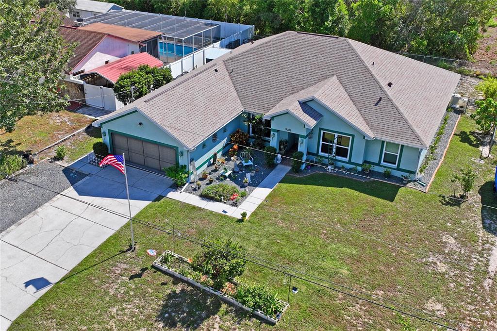 9086 Manchester Street Spring Hill, FL 34606 - Photo 48 of 50 an aerial view of a house
