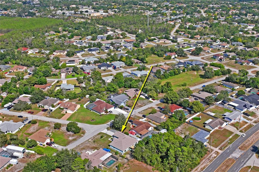 9086 Manchester Street Spring Hill, FL 34606 - Photo 50 of 50 an aerial view of residential houses with outdoor space