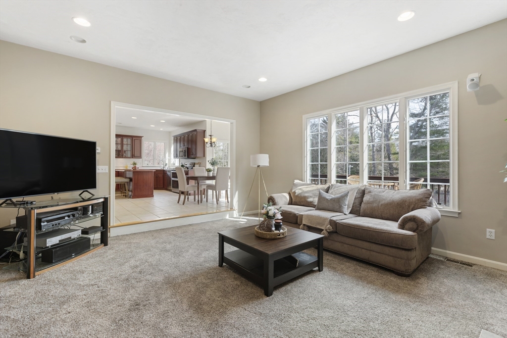 10 Anna Way Norton, MA 02766 - Photo 18 of 40 a living room with furniture and a flat screen tv