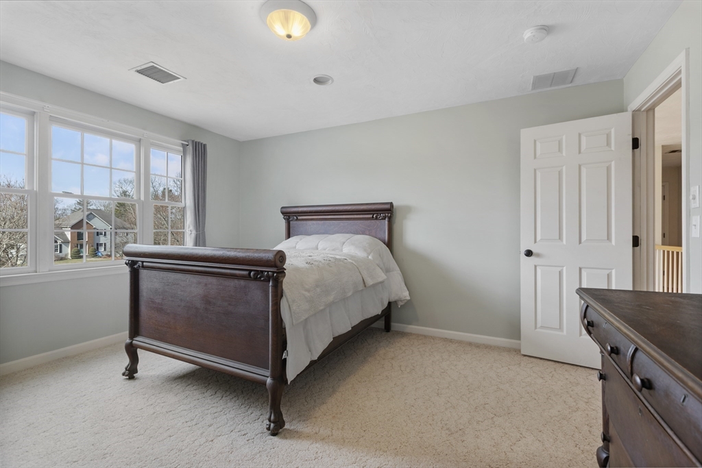 10 Anna Way Norton, MA 02766 - Photo 26 of 40 a bedroom with a bed and window