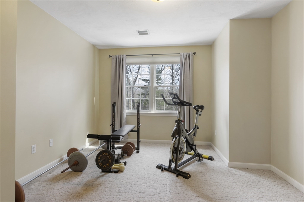 10 Anna Way Norton, MA 02766 - Photo 28 of 40 a view of a room with gym equipment