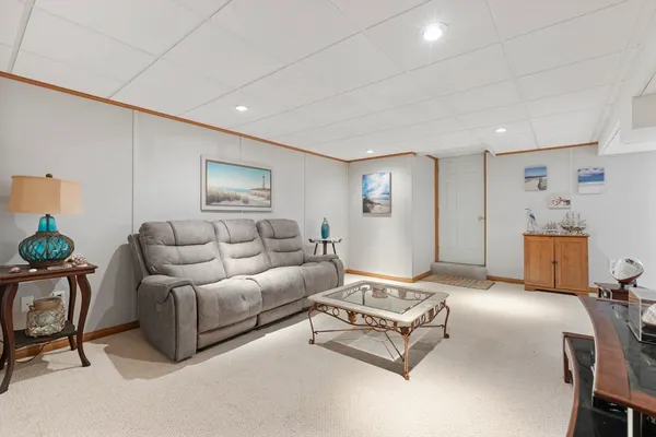a living room with furniture and a couch