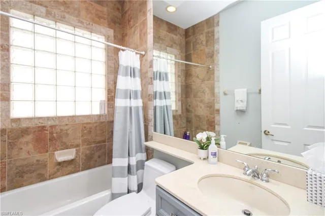 a bathroom with a sink and a bathtub