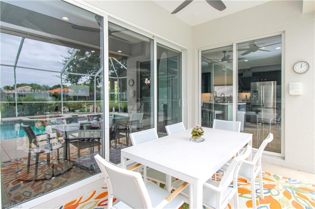 372 Mallory Court Naples, FL 34110 - Photo 43 of 48 a view of a dining room with furniture window and outside view
