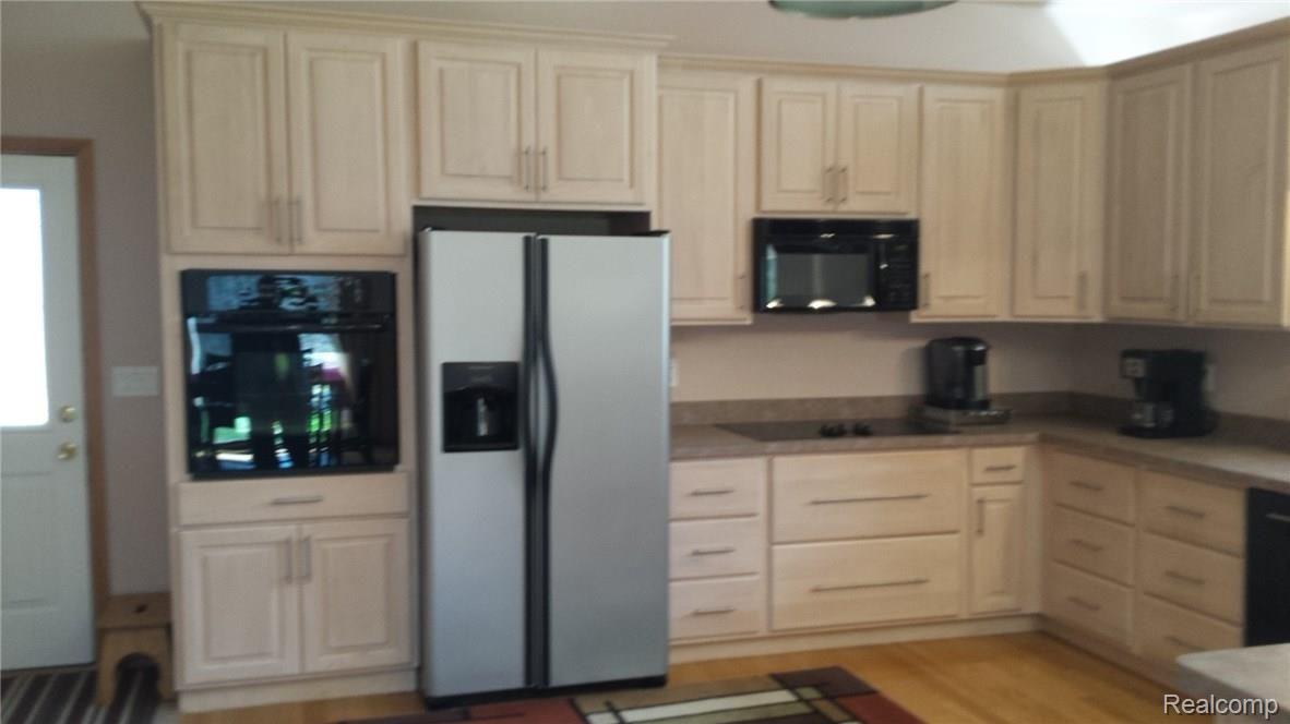 4825 Mill Creek Road Avoca, MI 48006 - Photo 3 of 37 This is another view of the kitchen.