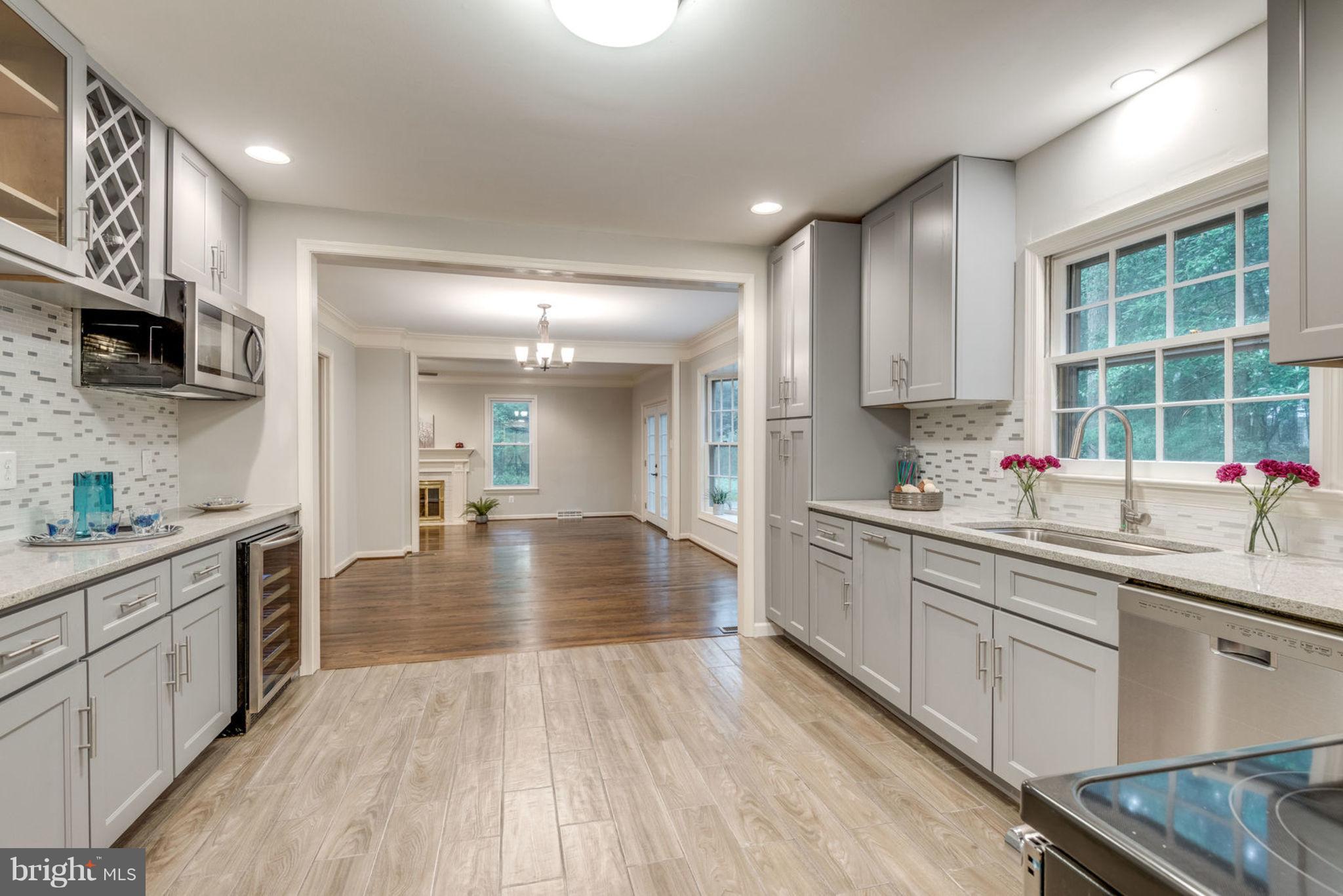 11405 Drop Forge Lane Reston, VA 20191 - Photo 11 of 30 Kitchen flows to dining/living spaces