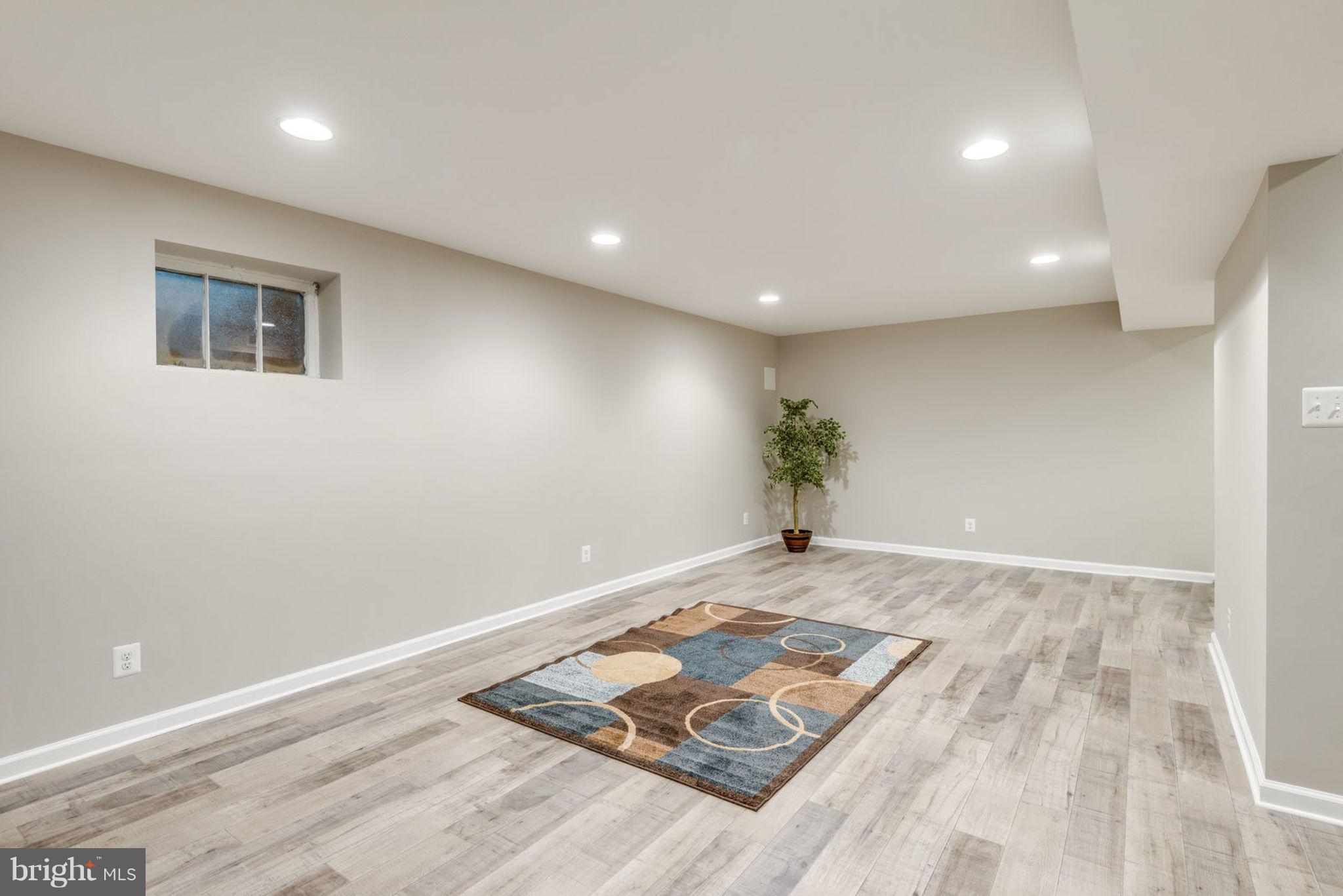 11405 Drop Forge Lane Reston, VA 20191 - Photo 25 of 30 Completely refinished basement with ample light