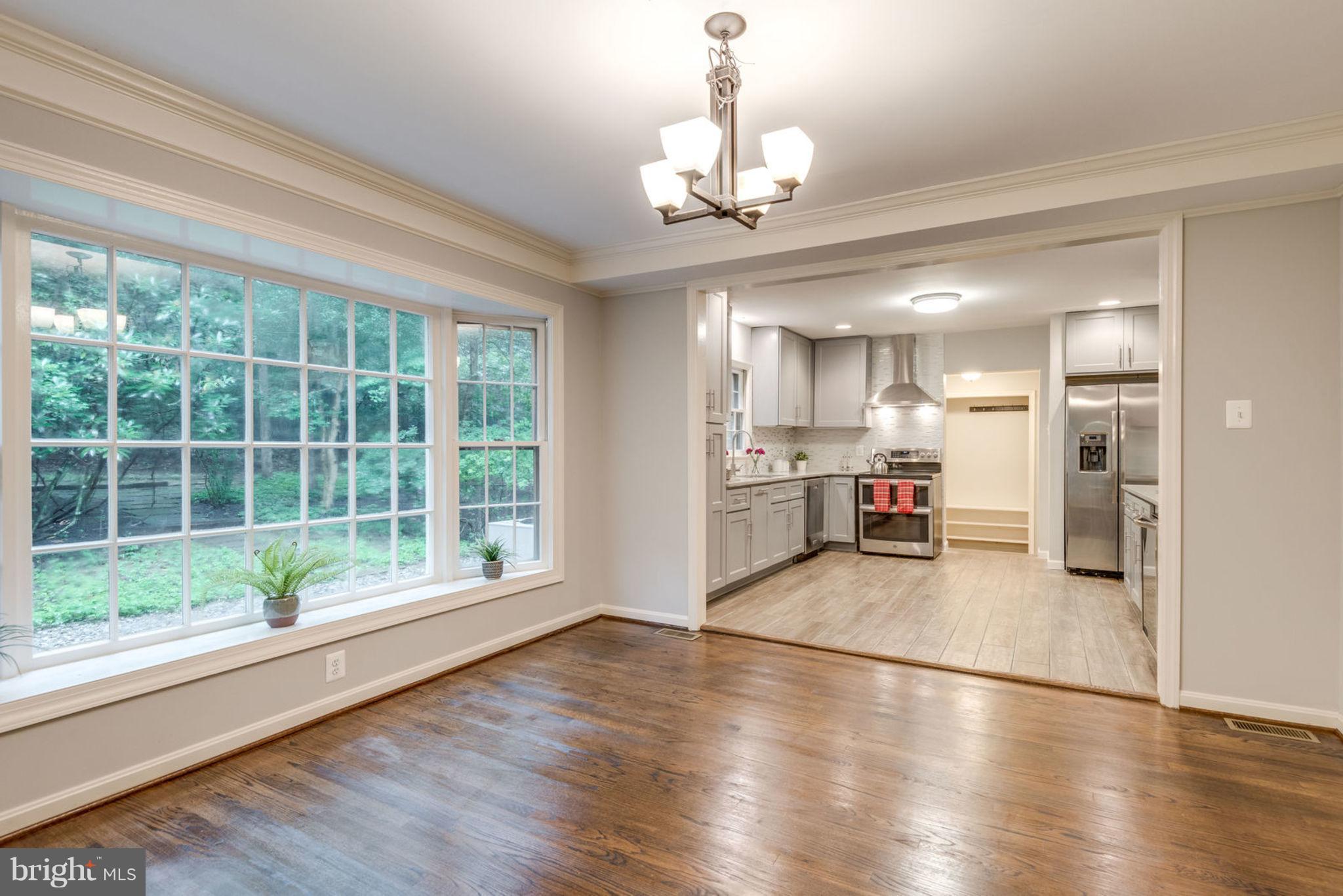 11405 Drop Forge Lane Reston, VA 20191 - Photo 6 of 30 Dining Room opens to kitchen
