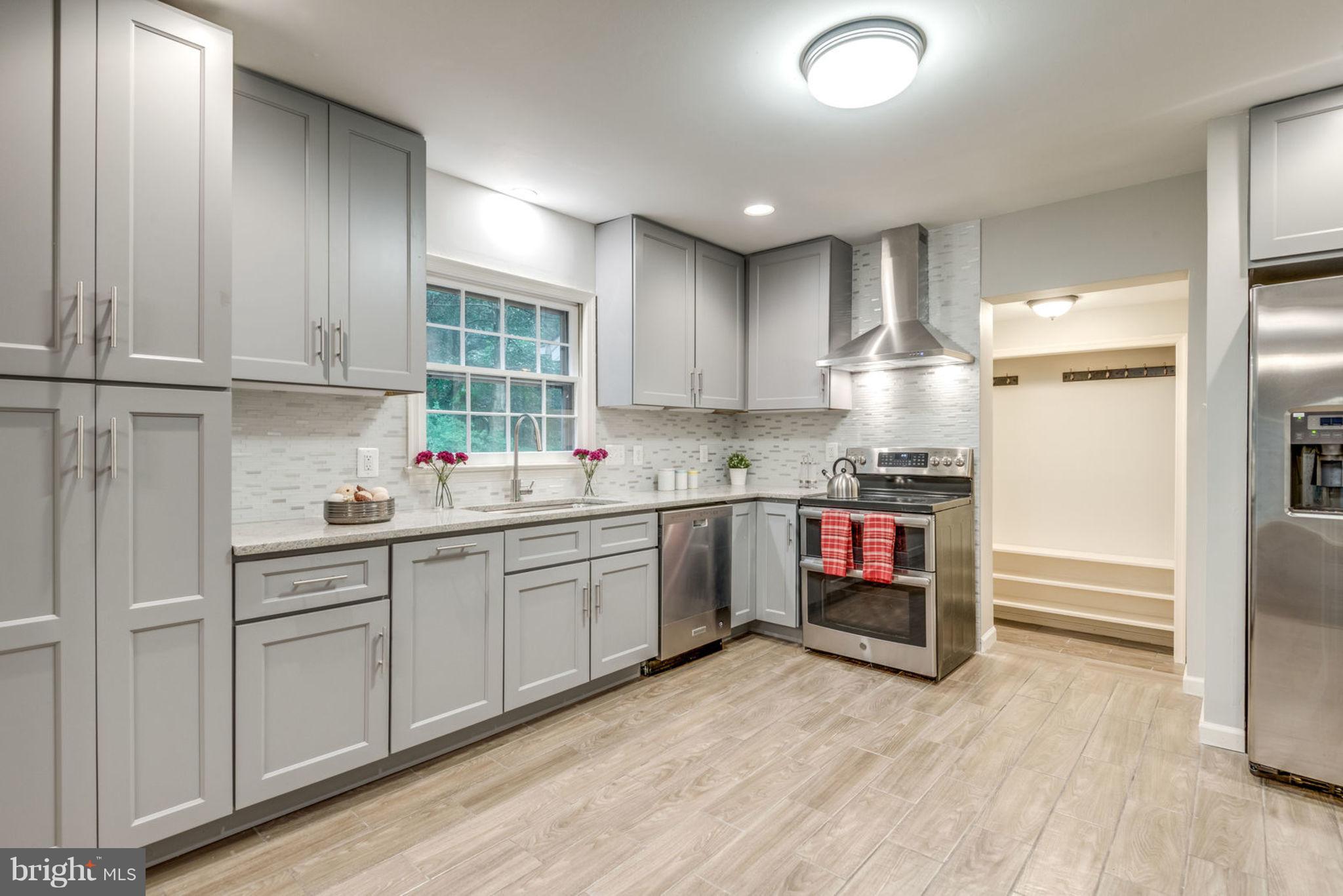 11405 Drop Forge Lane Reston, VA 20191 - Photo 9 of 30 Kitchen with entry to backyard & garage