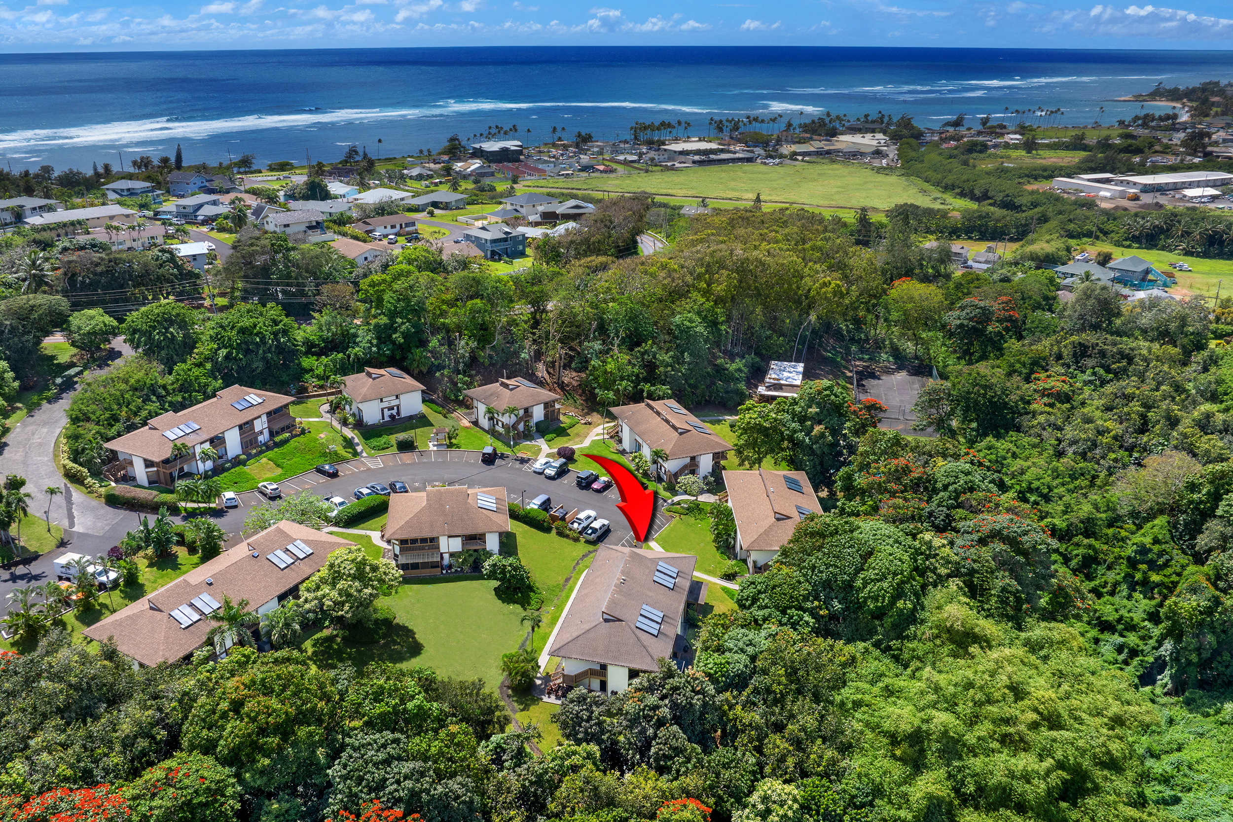 4701 Kawaihau Road, Unit F201 Kapaa, HI 96746 - Photo 1 of 11 a view of lake and houses with outdoor space