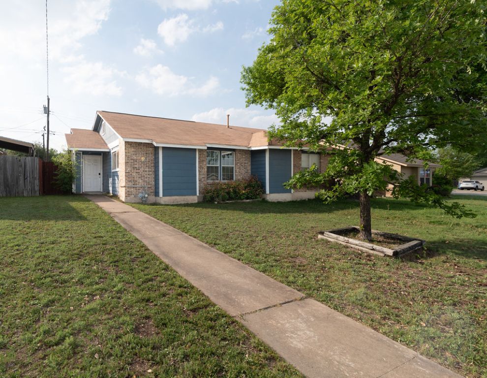 16110 Windermere Drive Pflugerville, TX 78660 - Photo 1 of 39 a front view of house with yard