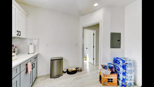 a bedroom with furniture and a window