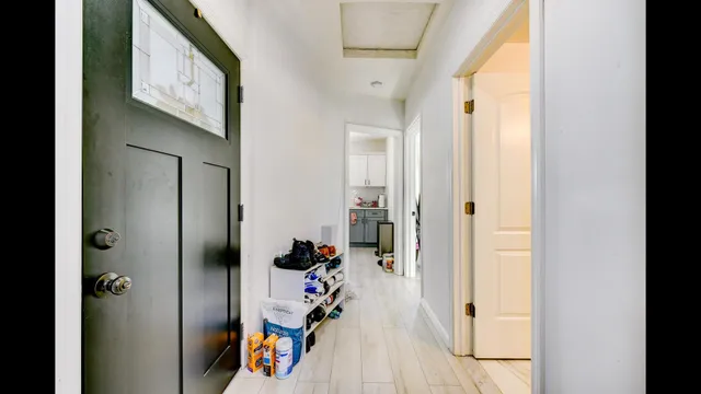 a room with bed and flat screen tv