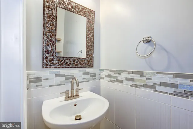 a bathroom with a sink and a toilet