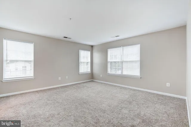 a bathroom with a sink a mirror and a toilet