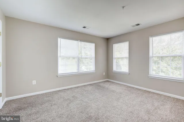 an empty room with an entryway