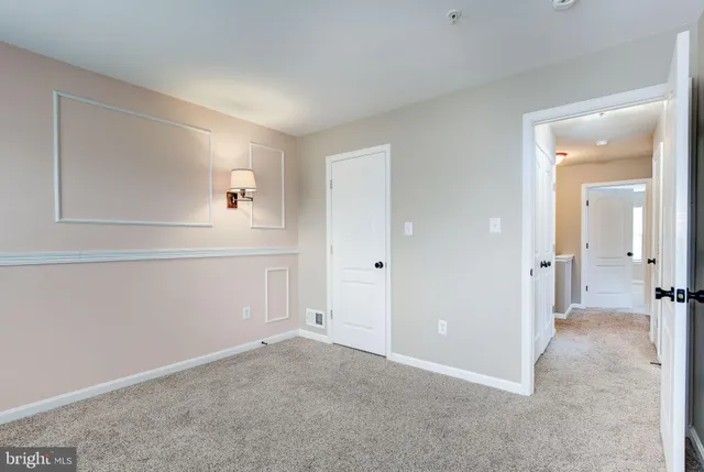 a view of washer and dryer in a utility room