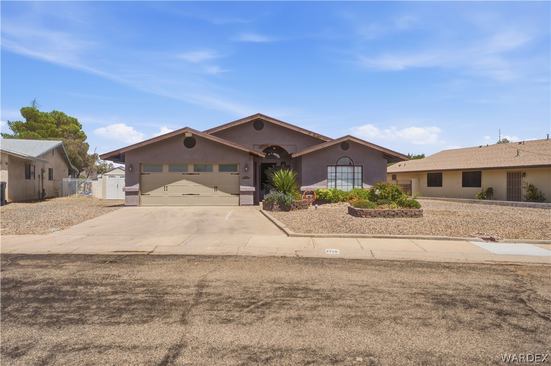 2719 Ricca Court Kingman, AZ 86401 - Photo 1 of 33 a view of a house with a yard