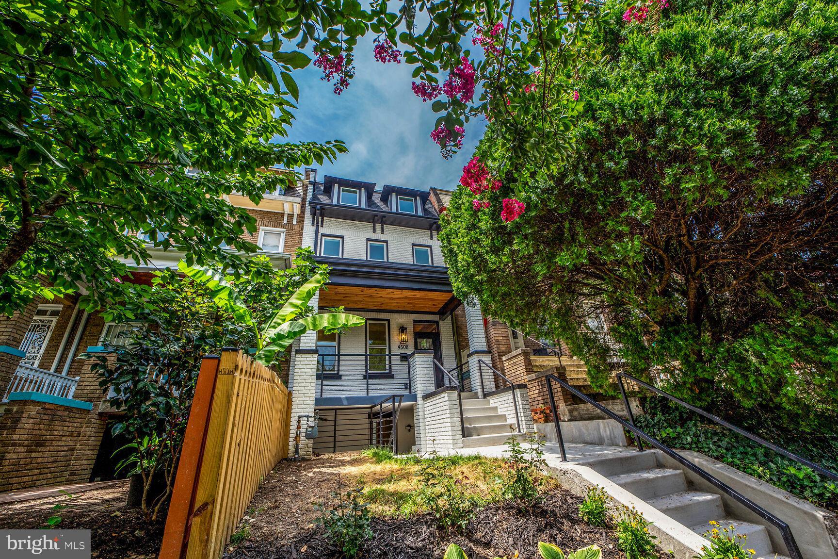 a view of a chairs and table in a patio