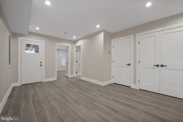 a view of outdoor space with wooden floor