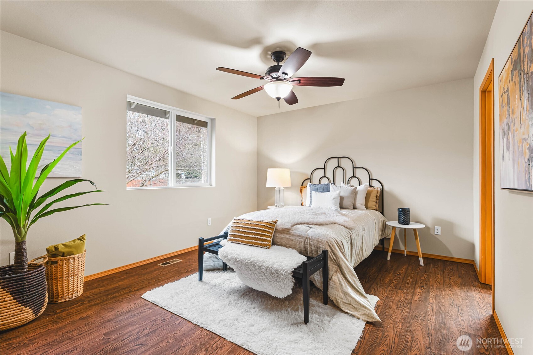 3765 Earendel Avenue Bremerton, WA 98310 - Photo 16 of 29 a bedroom with a bed table closet and a window