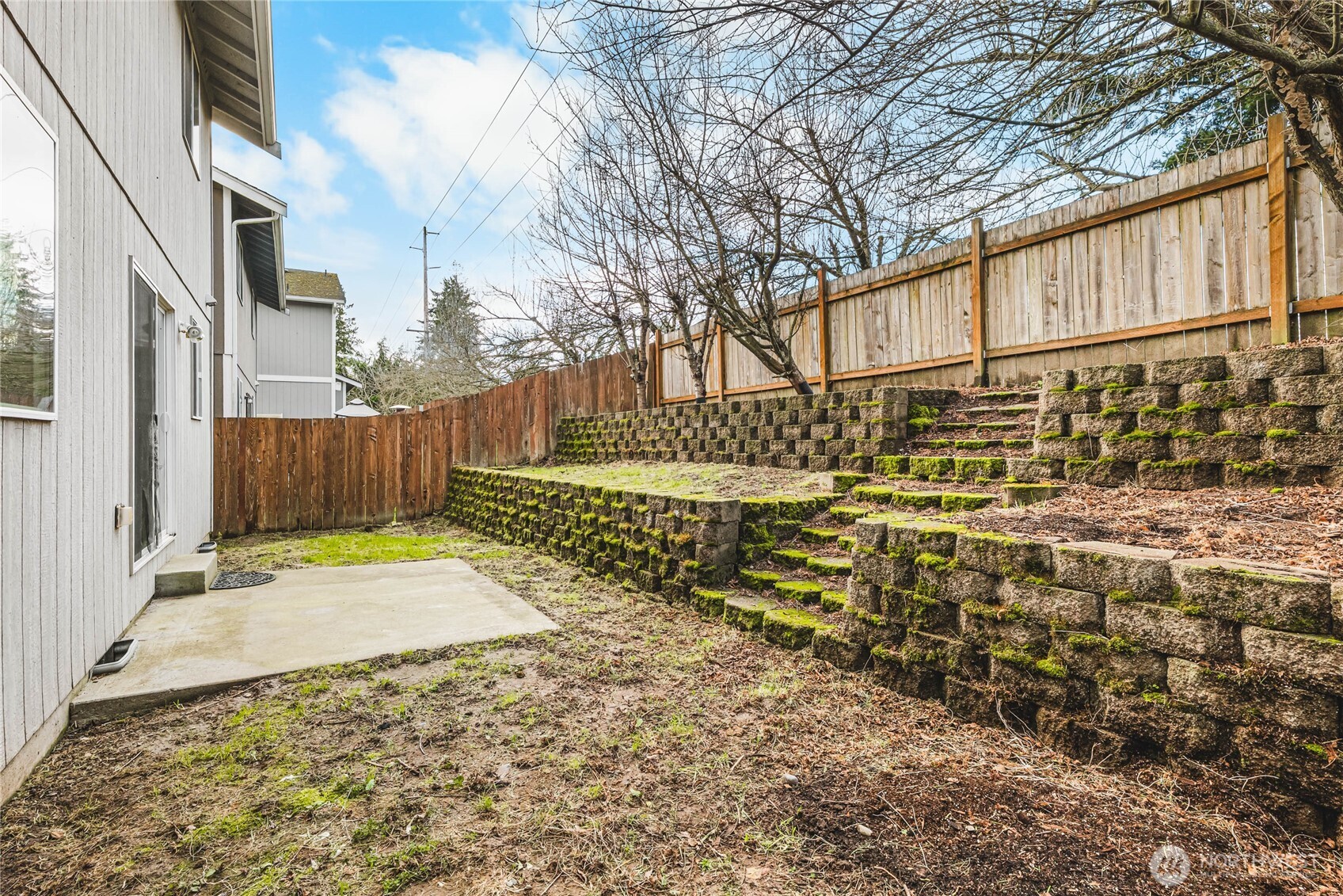 3765 Earendel Avenue Bremerton, WA 98310 - Photo 27 of 29 a view of a yard with wooden fence
