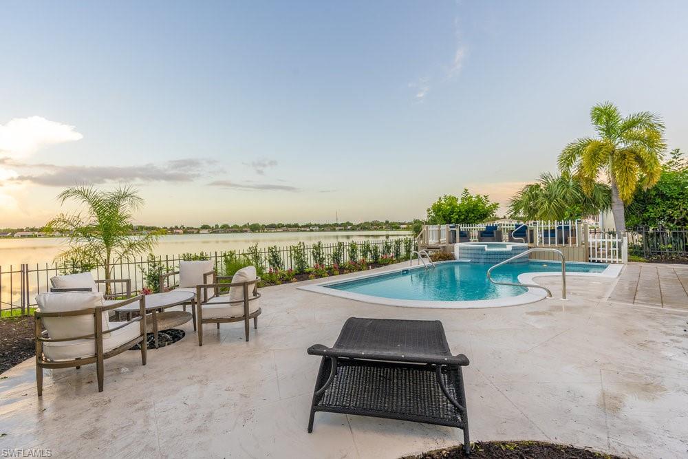 6831 Mill Pond Circle Naples, FL 34109 - Photo 27 of 45 an outdoor space with patio