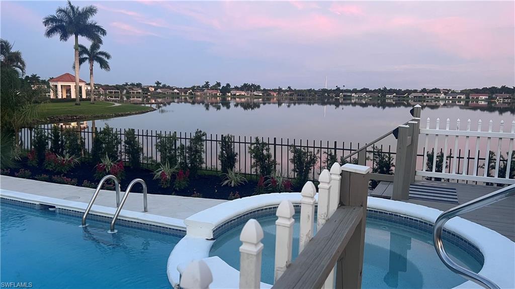 6831 Mill Pond Circle Naples, FL 34109 - Photo 34 of 45 a terrace of a house with outdoor seating